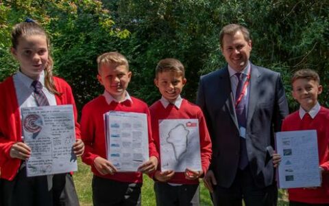 Children at St Peter’s Cross Keys C of E Academy discuss their concerns about overfishing in the world’s oceans with Robert Jenrick MP