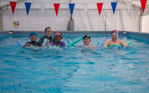 Children at Burntstump Seely C of E Primary Academy in Arnold have splashing time in playground swimming pool!